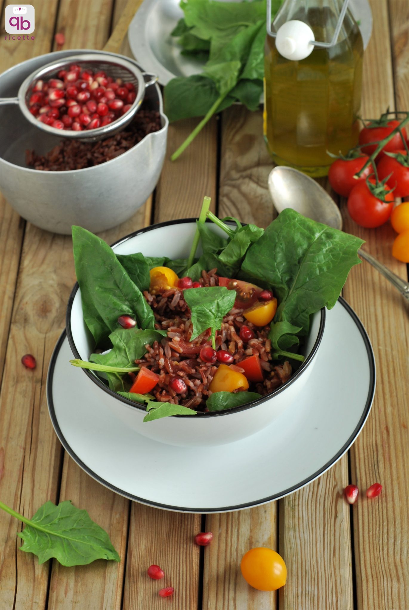 insalata di riso rosso con spinaci e melograno